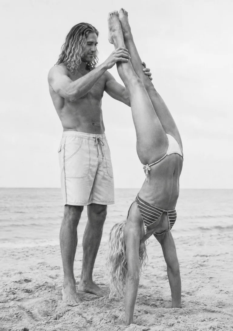 Vintage black and white beach photo, playful moment